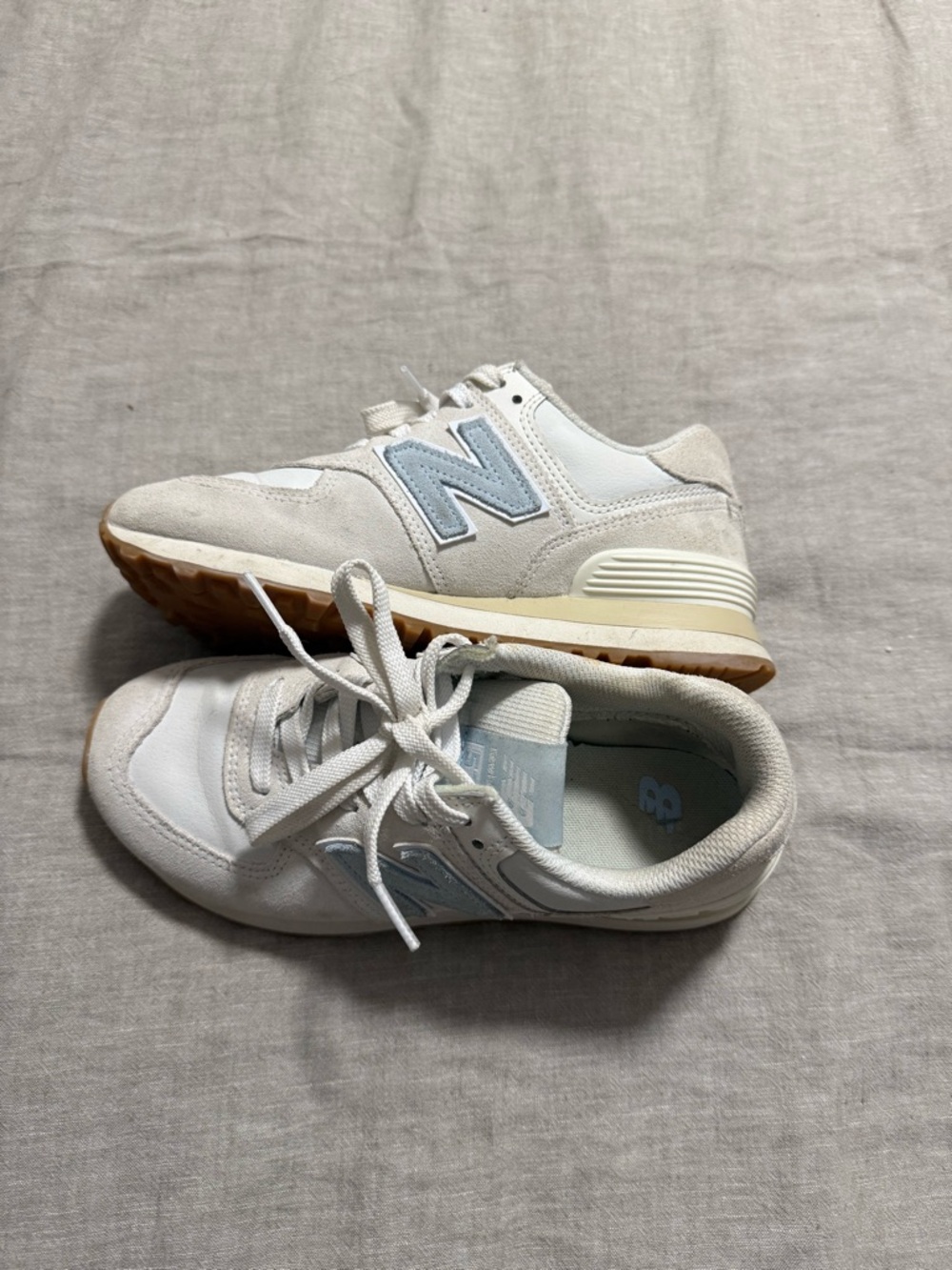 New Balance sneakers in White and Light Blue with Gum Sole